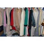 ONE RAIL OF THIRTY SEVEN LADIES WOOLLEN COATS, TRENCH COATS AND HATS, to include thirteen assorted
