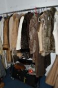 ONE RAIL OF TWENTY FOUR ASSORTED WINTER COATS, SHEEPSKINS AND GILETS, to include sheepskins and faux
