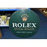 A LARGE CIRCULAR ROLEX SHOP SIGN, diameter 61cm, green background with the gold Rolex crown logo and