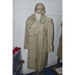A GENTLEMAN'S BURBERRY TRENCH COAT, UK size 44, together with a cotton Burberry style cap (1) (