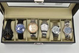A WATCH DISPLAY CASE WITH SIX WRISTWATCHES, to include a 'Casio HD' fitted with a black rubber