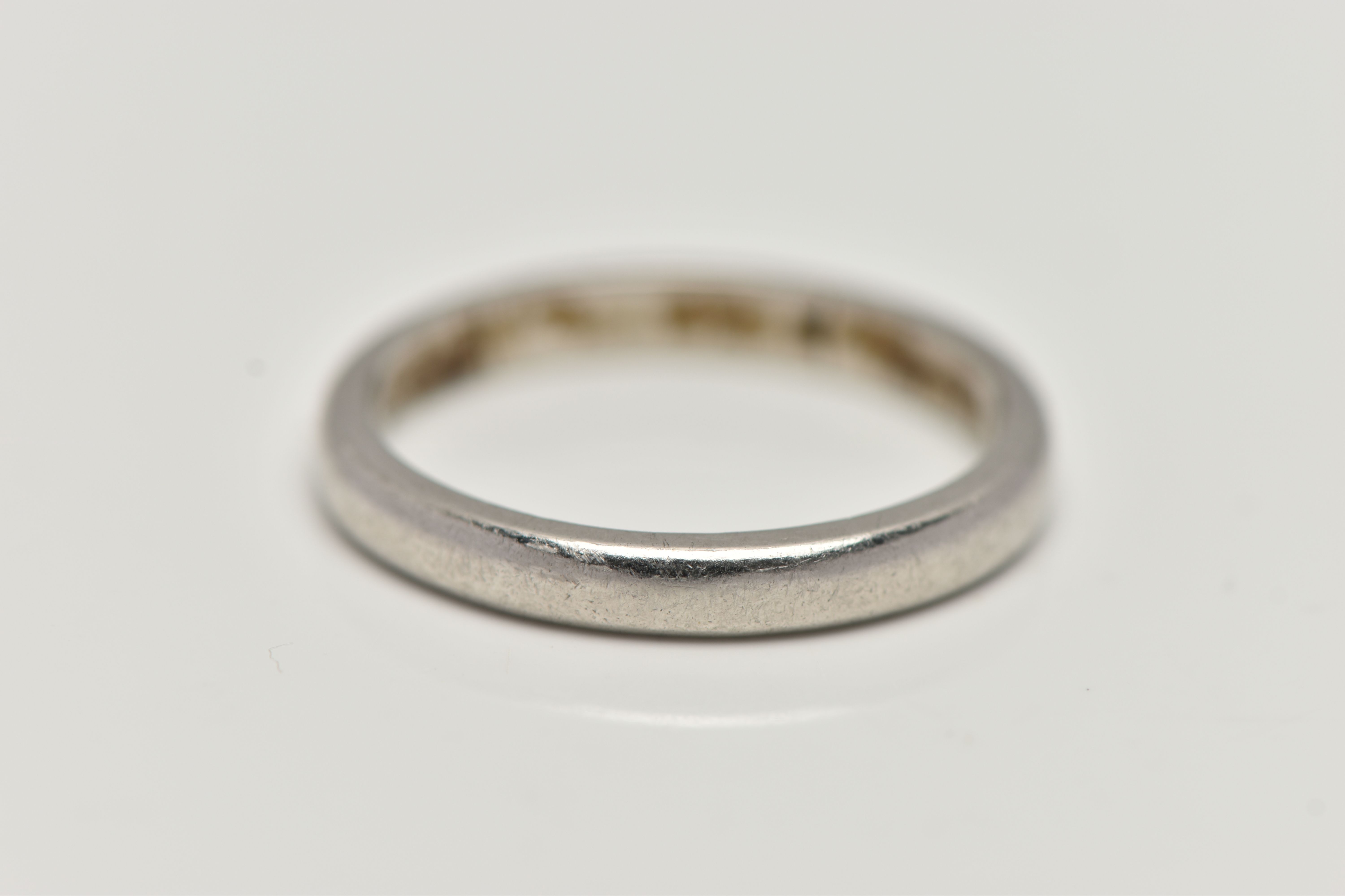 A POLISHED WHITE METAL BAND RING, unmarked band, ring size K, approximate gross weight 3.9 grams ( - Image 2 of 2
