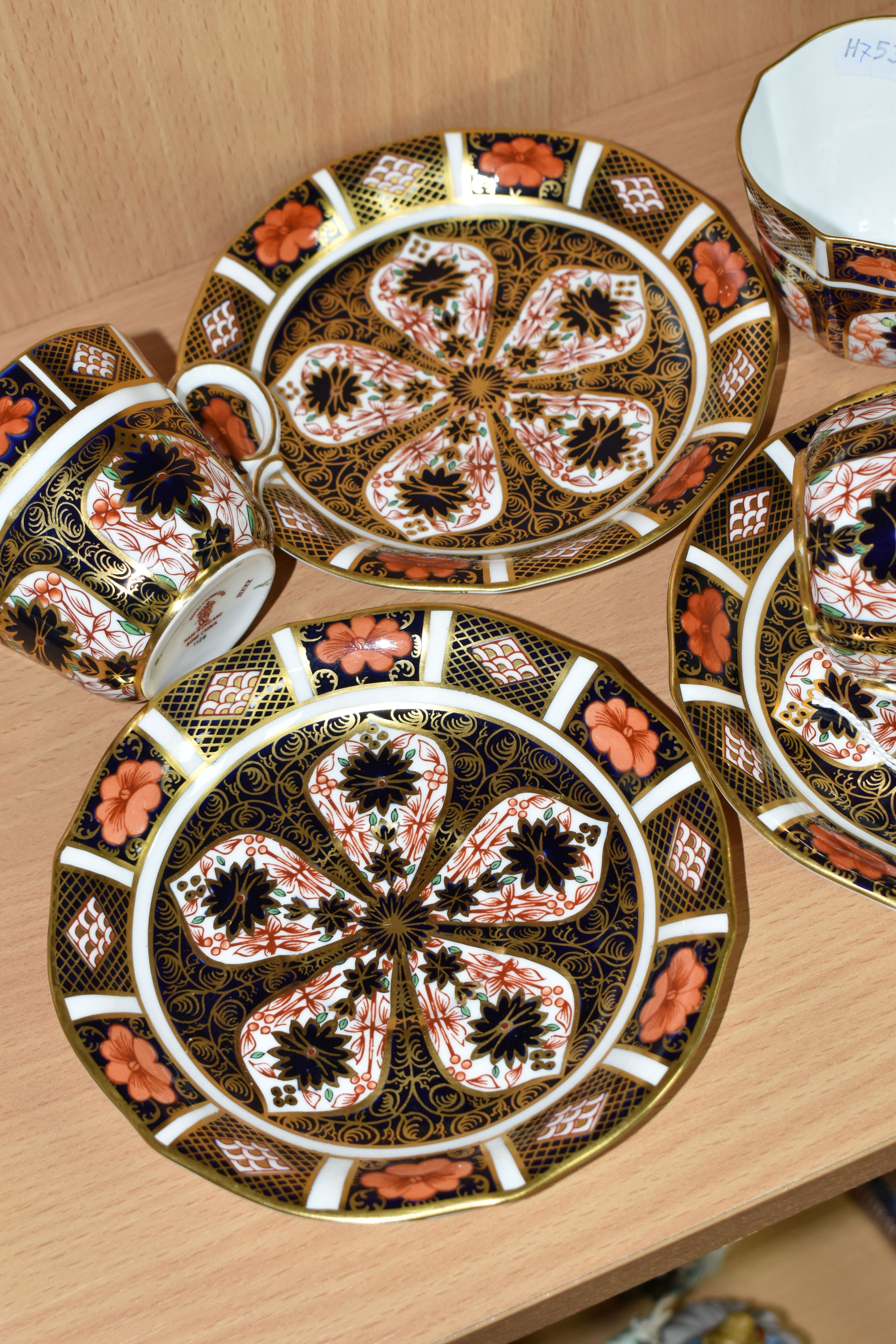 THREE ROYAL CROWN DERBY IMARI 1128 TEACUPS AND SAUCERS, having red printed backstamps, most pieces - Image 4 of 4