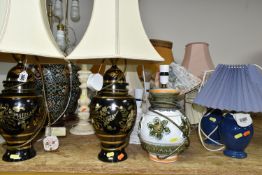 A LARGE QUANTITY OF TABLE LAMPS, comprising twenty one lamps, mostly ceramic bedside lamps, two