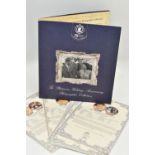 A CASED PLATINUM WEDDING ANNIVERSARY PHOTOGRAPHIC COIN COLLECTION, celebrating the 70th wedding