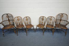 A SET OF SIX REPRODUCTION ELM DINING CHAIRS, to include a pair of spindle hoop back Windsor