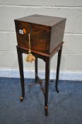AN EARLY 20TH CENTURY MAHOGANY TOILET BOX ON STAND, the square box inlaid with patera to the top and