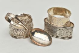 THREE 20TH CENTURY SILVER NAPKIN RINGS AND A SILVER BABY’S SPOON, including an oval napkin ring with