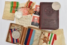 A SELECTION OF WORLD WAR TWO MEDALS AND A MONEY BOX, to include the Africa Star, the 1939-45 War