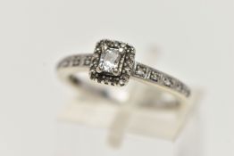 A 9CT WHITE GOLD DIAMOND CLUSTER RING, square head set with an emerald cut diamond, in a surround of