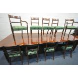 AN EARLY VICTORIAN WALNUT DOUBLE D END DINING TABLE, with three additional leaves, on fluted legs,