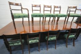 AN EARLY VICTORIAN WALNUT DOUBLE D END DINING TABLE, with three additional leaves, on fluted legs,