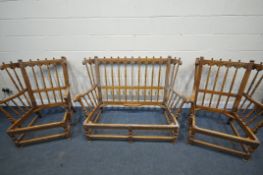 AN ERCOL OLD COLONIAL ELM THREE PIECE SUITE, comprising a two seater settee, length 140cm x depth