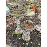 A COMPOSITE BIRD BATH, on a separate base with a floral design, 40cm diameter x height 65cm