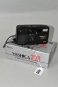 A BOXED YASHICA T5 COMPACT CAMERA WITH CARL ZEISS LENS, the black 35mm camera having a Carl Zeiss