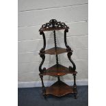 A VICTORIAN ROSEWOOD GRADUATED FOUR TIER WHATNOT, with an open fretwork gallery, joined by