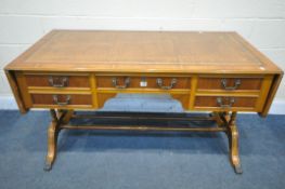 A YEWWOOD DROP END WRITING DESK, , with a brown leather writing surface, with five drawers, open