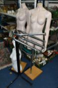 THREE RETAIL WINDOW DUMMIES AND FLOOR STANDING CLOTHES RAIL, to include two floor standing female