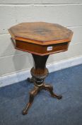 A VICTORIAN WALNUT OCTAGONAL TRUMPET SEWING TABLE, enclosing a fitted interior, on a shaped