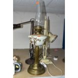 A COLLECTION OF LAMPS, comprising a Victorian oil lamp, height 63cm to top of chimney, a cream