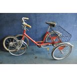 A PASHLEY PICADOR TRICYCLE, in relatively good condition, missing some parts, along with a spare