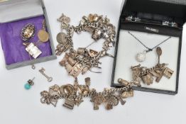 TWO CHARM BRACELETS, TWO PENDANT NECKLACES AND A BROOCH, two charm bracelets, one has each link