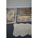 TWO SILK EFFECT RUGS, of two designs and colours, 112cm x depth 68cm, along with a Chinese woollen