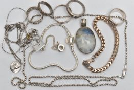 AN ASSORTMENT OF WHITE METAL JEWELLERY, to include two bracelets, five rings, a hard stone