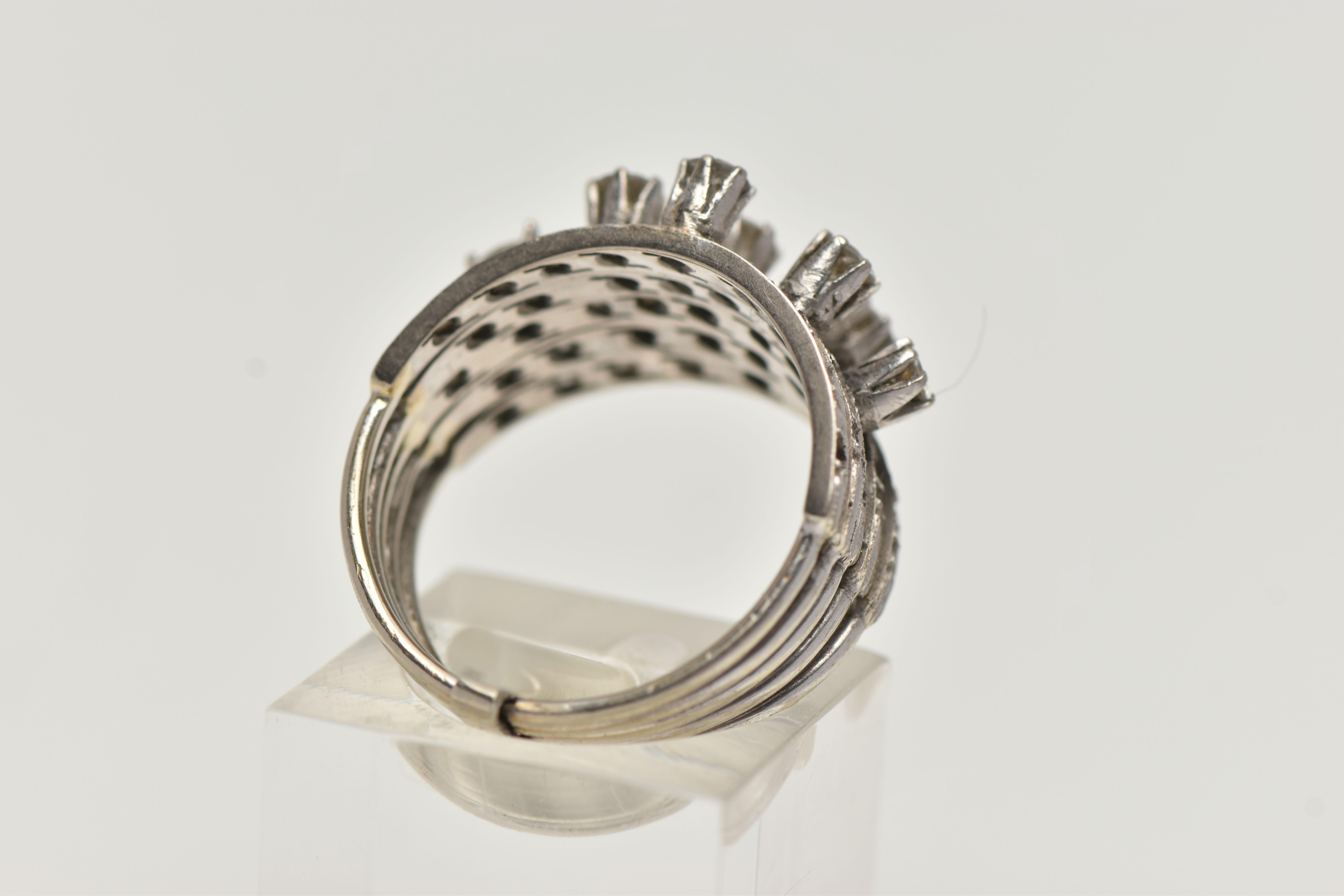 A WHITE METAL DIAMOND RING, comprising of five individual bands fitted together with a band - Image 3 of 5