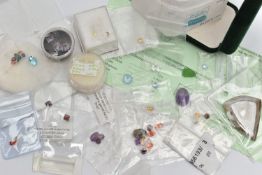 A SELECTION OF FACETED LOOSE GEMSTONES, to include various cut garnets, amethyst, quartz, an oval