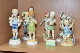 A SET OF SEVEN ROYAL WORCESTER BOY DAYS OF THE WEEK FIGURES, comprising Monday 3519, Tuesday 3534,