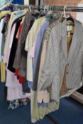 A LARGE QUANTITY OF LADIES JACKETS, BLAZERS, SUITS AND DRESSES, to include assorted colours and