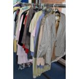 A LARGE QUANTITY OF LADIES JACKETS, BLAZERS, SUITS AND DRESSES, to include assorted colours and