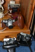A GROUP OF VINTAGE CAMERAS, to include a Canon Canonet camera 1483718 with original box and