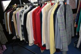 ONE RAIL OF FORTY SEVEN LADIES JACKETS, assorted colours and styles, mainly UK size 16, seven 1980's