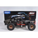 A BOXED HORIZON HOBBY LOSI TENACITY 1:10 SCALE 4WD LASERNUT ROCK RACER REMOTE CONTROLLED CAR,