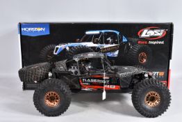 A BOXED HORIZON HOBBY LOSI TENACITY 1:10 SCALE 4WD LASERNUT ROCK RACER REMOTE CONTROLLED CAR,