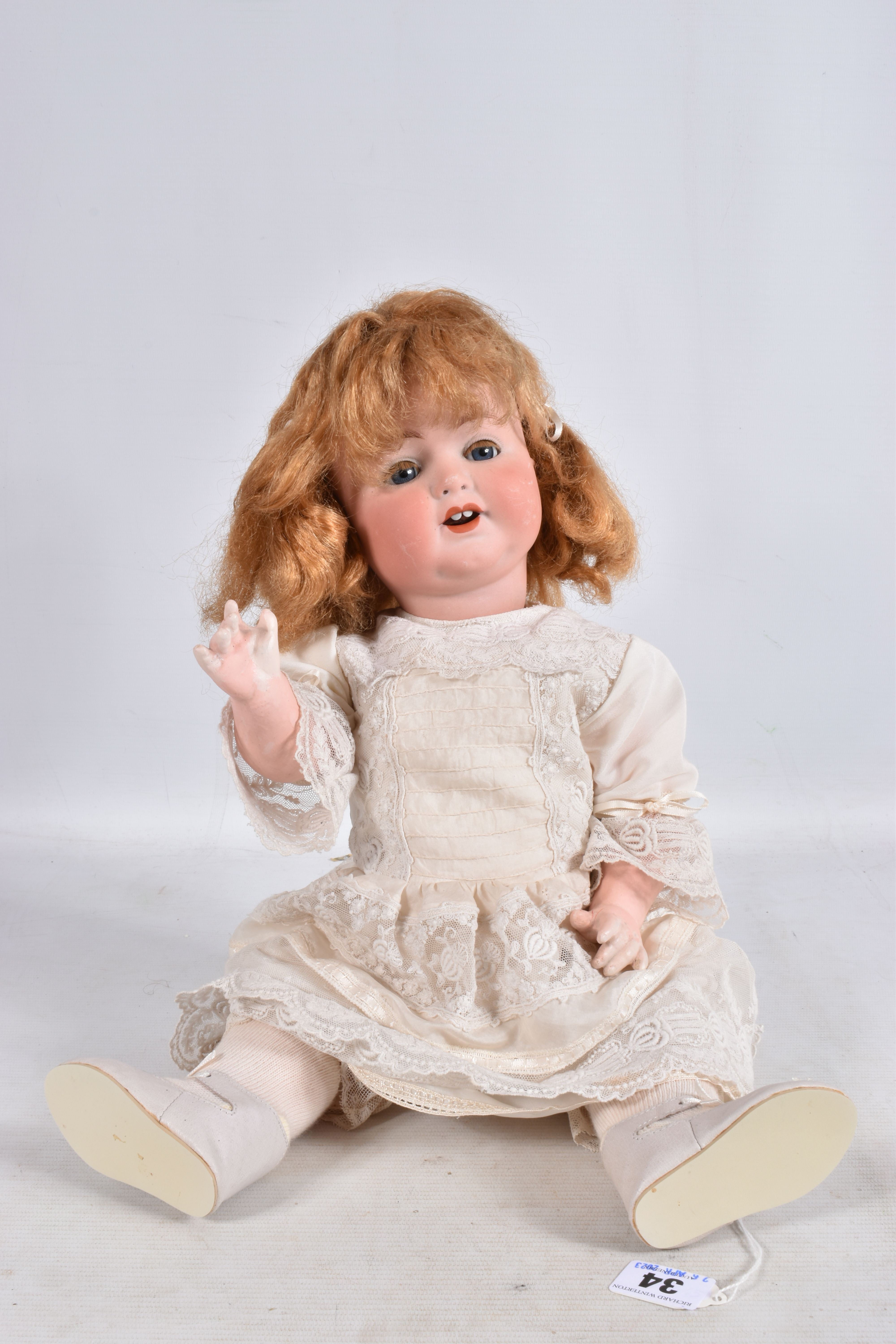 AN ARMAND MARSEILLE BISQUE HEAD DOLL, nape of neck marked 'Armand Marseille Germany 996 A.7.M',