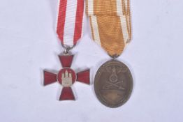 A WW1 HAMBURG CROSS AND A WW2 WEST WALL MEDAL, BOTH MEDALS COME WITH a correct ribbon and are in