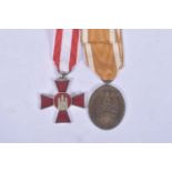 A WW1 HAMBURG CROSS AND A WW2 WEST WALL MEDAL, BOTH MEDALS COME WITH a correct ribbon and are in