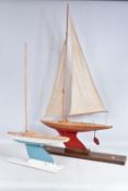 TWO MID-20th CENTURY MODEL BOWMAN POND RACING YACHTS, the first a Bowman 'Gull' boat, painted sky
