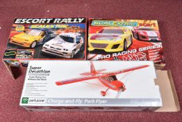 A BOXED PARK ZONE SUPER DECATHLON CHARGE AND FLY PARK FLYER, red red primary colour with blue stripe