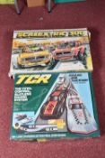 A BOXED TCR ZIGZAG JAM RACEWAY 3 CAR SYSTEM ELECTRIC MODEL RACING TRACK, box in fair condition for