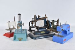 A QUANTITY OF ASSORTED CHILDS MICROSCOPES AND SEWING MACHINES, to include Britex Naturalist