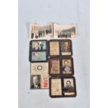 A COLLECTION OF FIVE WWII AND LATER GERMAN TRAVEL PASSES AND TWO SMALL PHOTOGRAPHS, the passes are