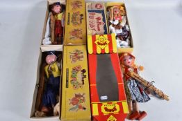 FOUR BOXED PELHAM SS PUPPETS, Cowgirl and Cowboy, Tyrolean Girl and Dutch Girl, all appear