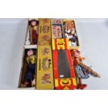 FOUR BOXED PELHAM SS PUPPETS, Cowgirl and Cowboy, Tyrolean Girl and Dutch Girl, all appear