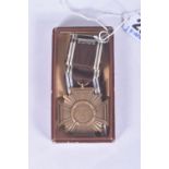 A THIRD REICH NSDAP TEN YEAR LONG SERVICE MEDAL IN BOX OF ISSUE, this medal is bronze and still