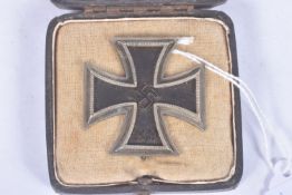 A NAMED WWII GERMAN FIRST CLASS IRON CROSS IN BOX OF ISSUE, this iron cross comes in a fitted box