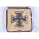 A NAMED WWII GERMAN FIRST CLASS IRON CROSS IN BOX OF ISSUE, this iron cross comes in a fitted box